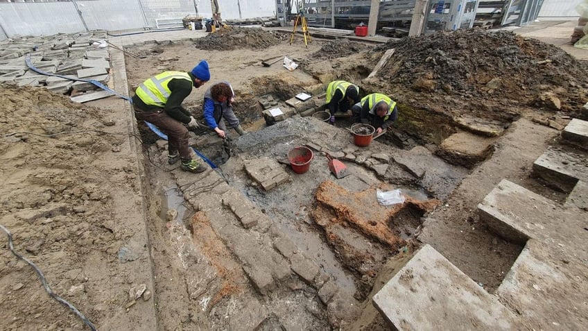 Archaeologists working during excavation