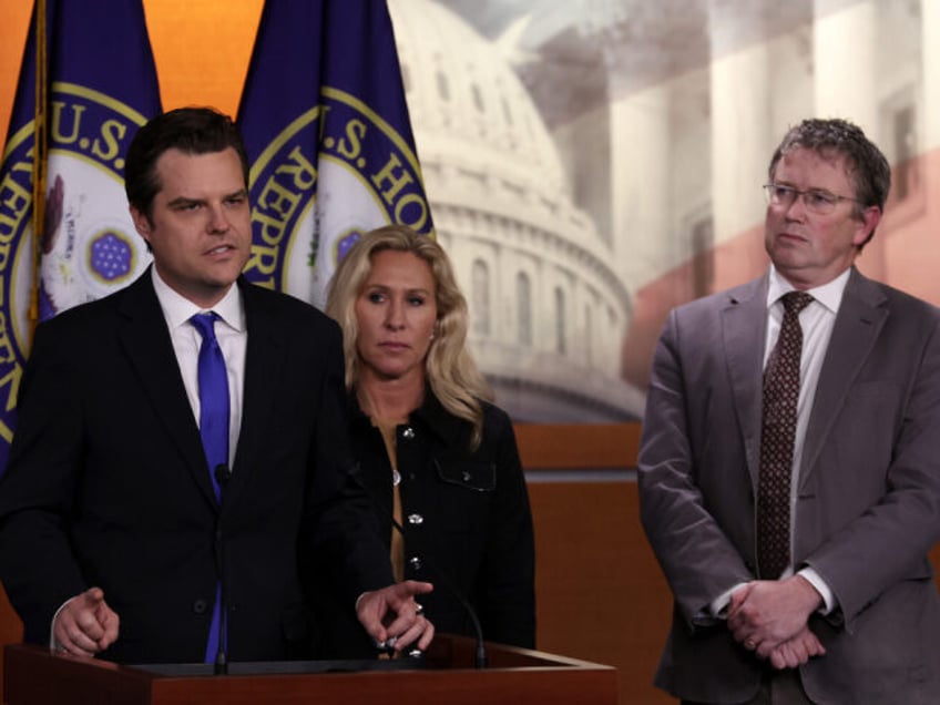 L-R) U.S. Rep. Matt Gaetz (R-FL) speaks as Rep. Marjorie Taylor Greene (R-GA) and Rep. Tho