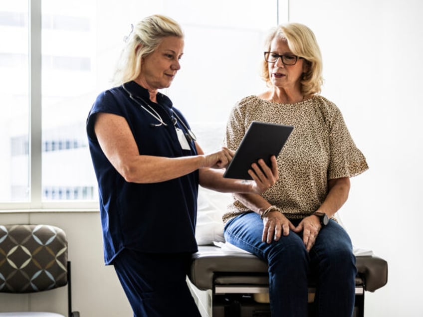 Doctor with patient