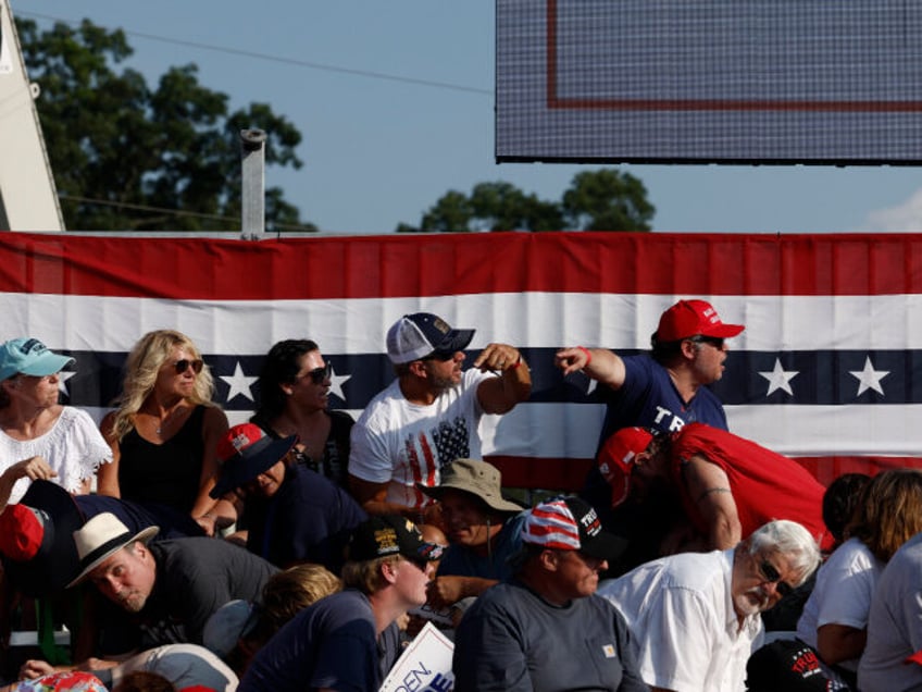 BUTLER, PENNSYLVANIA - JULY 13: The crowd reacts at republican presidential candidate form