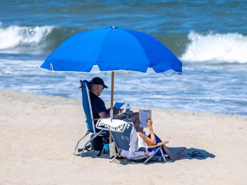 report biden on the beach again adding to 360 days 39 of his presidency already spent on vacation