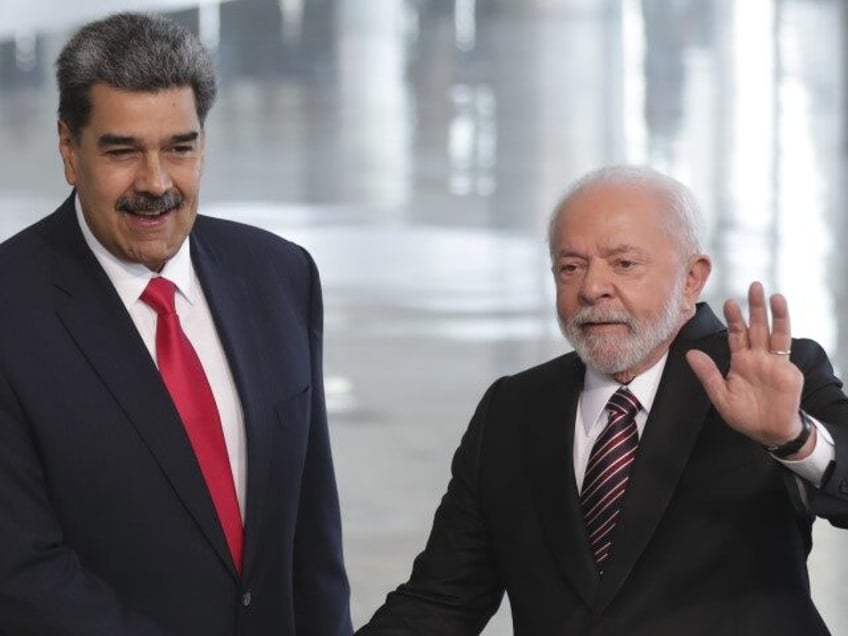 Brazilian President Luiz Inacio Lula da Silva, second from right, and Brazilian first lady