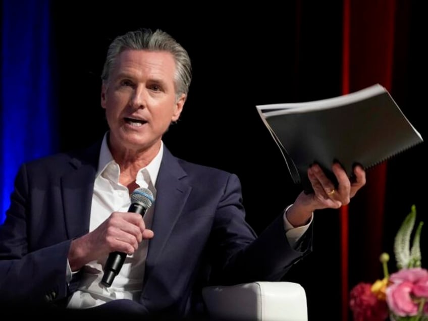 California Gov. Gavin Newsom holds a fireside chat with Stephen Cheung, the President and