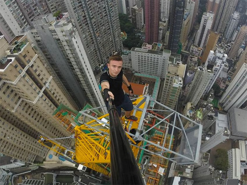 report daredevil frenchman plunges to death from hong kong high rise