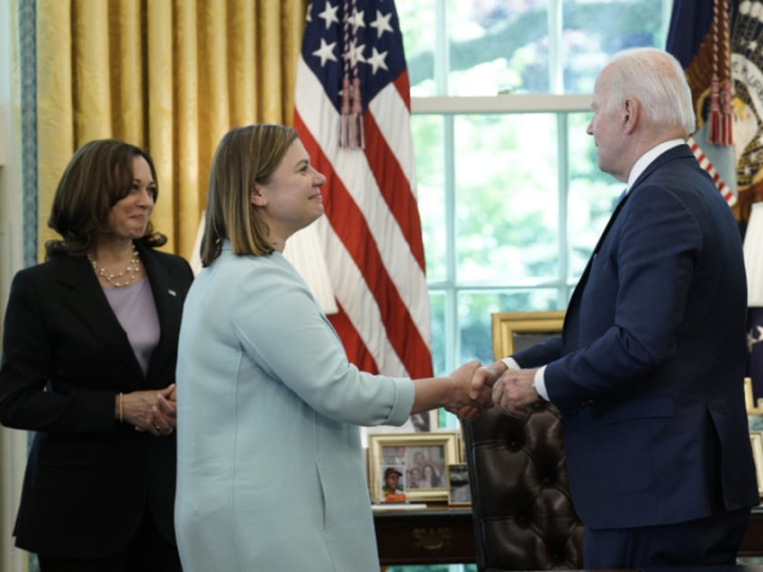 U.S. President Joe Biden shakes hands with Representative Elissa Slotkin, a Democrat from Michigan, after signing S. 3522, the "Ukraine Democracy Defense Lend-Lease Act of 2022," in the Oval Office of the White House in Washington, D.C., U.S., on Monday, May 9, 2022. Biden signed the measure into law designed to make it easier for the U.S. to send weapons and supplies to Ukraine as the country continues to fight off a Russian invasion that began in February. Photographer: Yuri Gripas/Abaca/Bloomberg via Getty Images