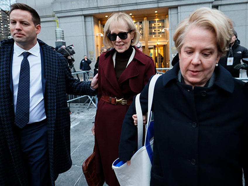 E. Jean Carroll (C) leaves Manhattan Federal Court on January 18, 2024 in New York City. Carroll concluded her testimony today in her defamation civil trial against former President Donald Trump, who did not attend today's trial to attend the funeral of his mother-in-law. The trial will decide how much …