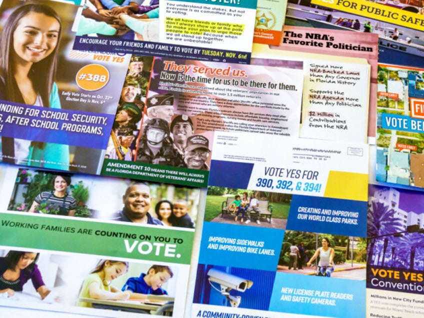 Miami Beach, voting advice and campaign mailers. (Photo by: Jeffrey Greenberg/Education Im