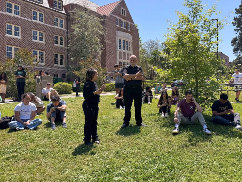 Florida State University students wait for news amid an active shooter incident at the sch
