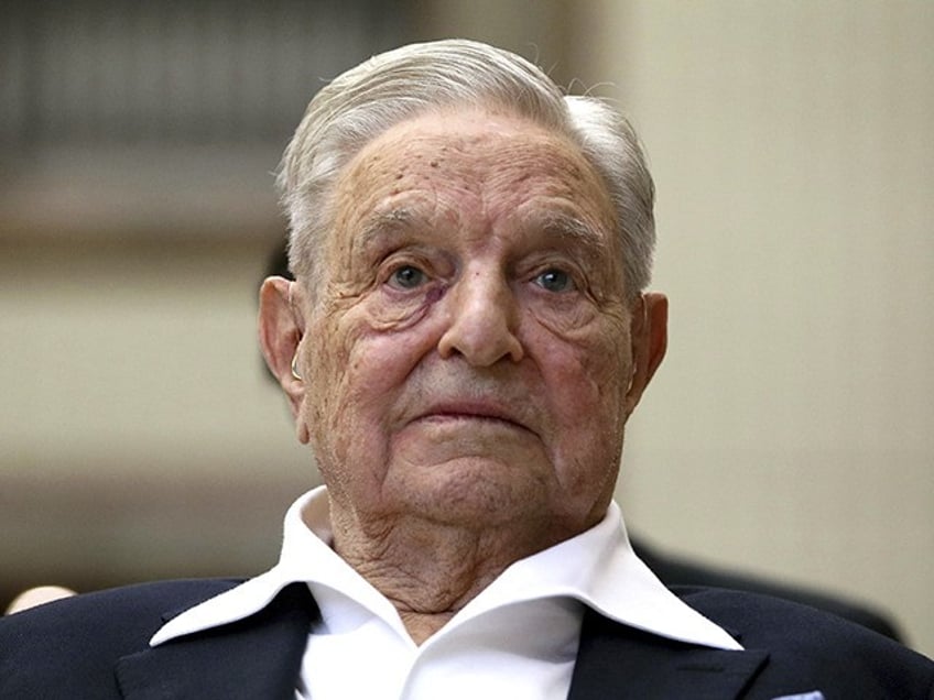 George Soros, Founder and Chairman of the Open Society Foundations, looks before the Josep