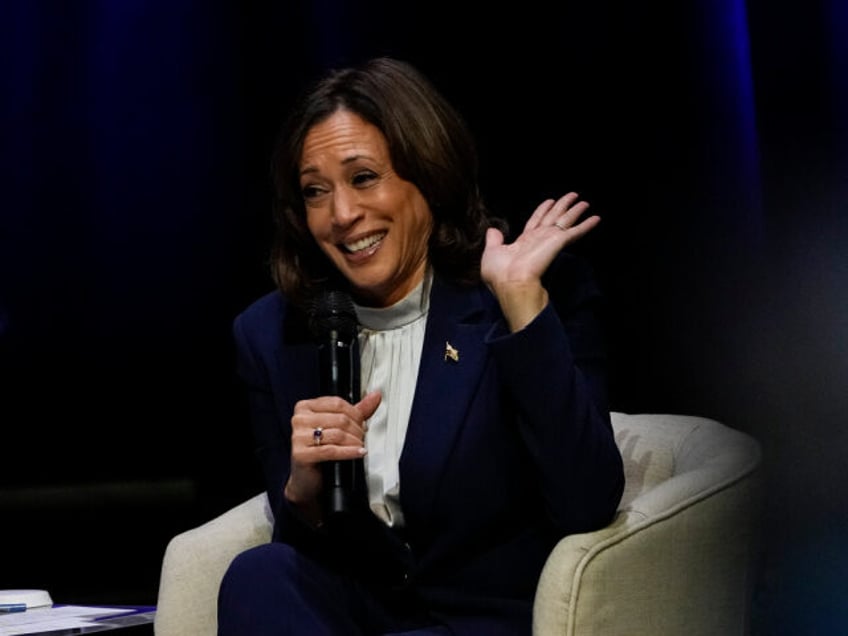 Vice President Kamala Harris laughs as she talks about climate change at Georgia Tech on W