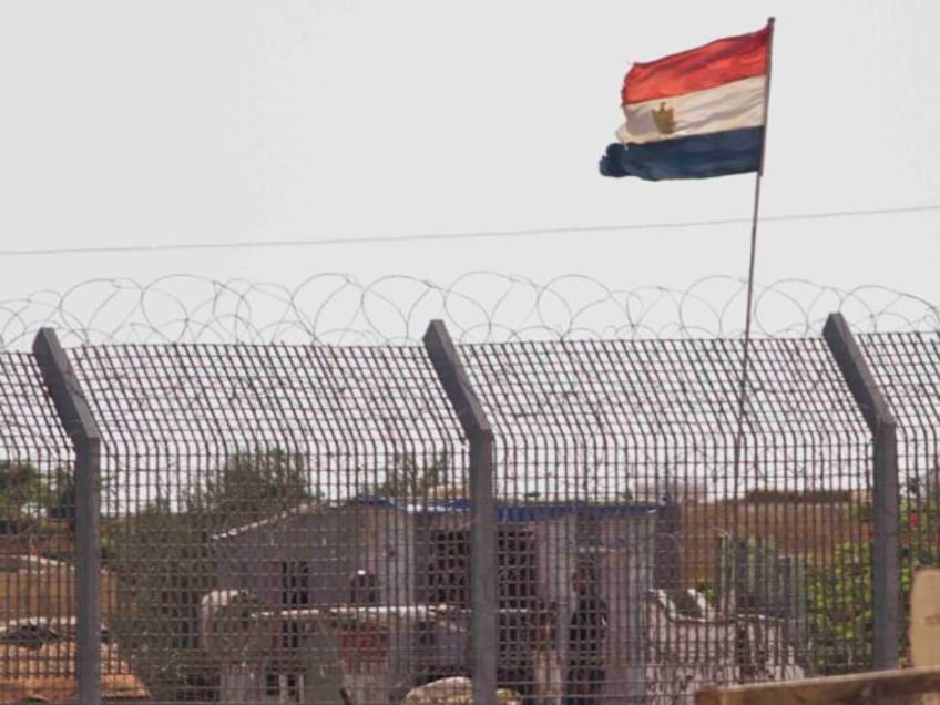 An Egyptian military officer watches at a post in Egypt's northern Sinai Peninsula, a