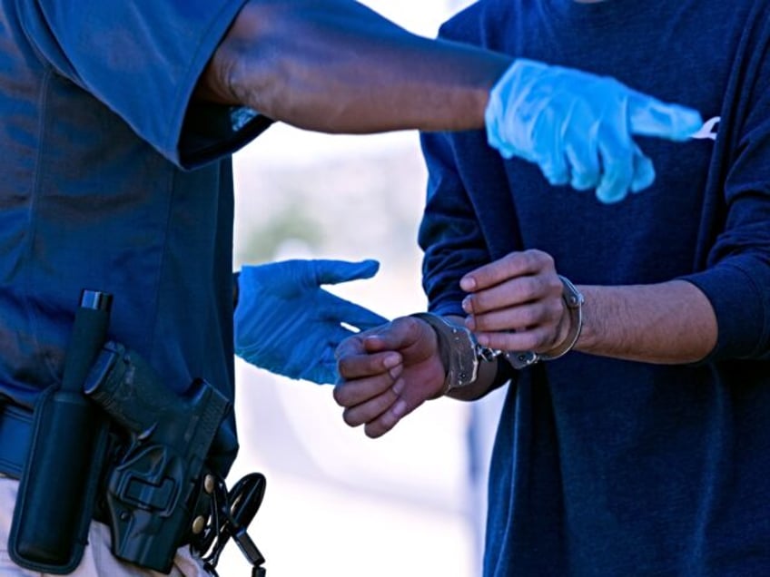 JACUMBA HOT SPRINGS, CA - JUNE 08: U.S. Border Patrol agents arrest an illegal asylum seek