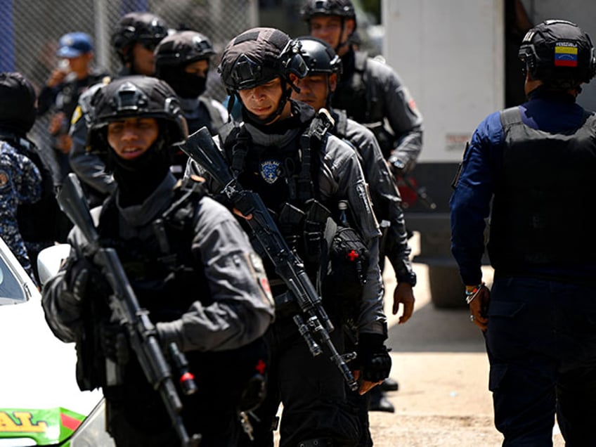 Special forces take a position outside the Tocoron prison a day after authorities seized control of the prison in Tocoron, Aragua State, Venezuela, on September 21, 2023. Venezuela said Wednesday it had seized control of a prison from the hands of a powerful gang with international reach, in a major operation involving 11,000 members of its security forces. (Photo by YURI CORTEZ / AFP) (Photo by YURI CORTEZ/AFP via Getty Images)