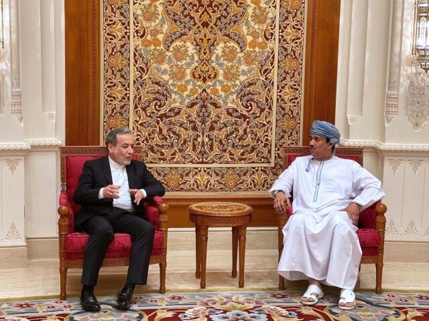 In this photo released by Iranian Foreign Ministry, Iranian Foreign Minister Abbas Araghch