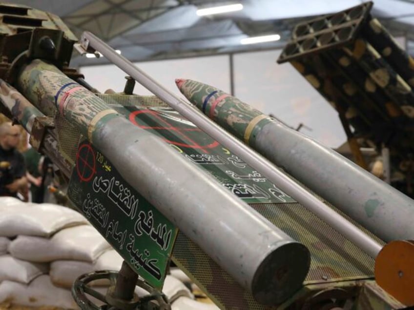 Rocket launchers captured from the rebels in Syria are displayed during a briefing by Russ