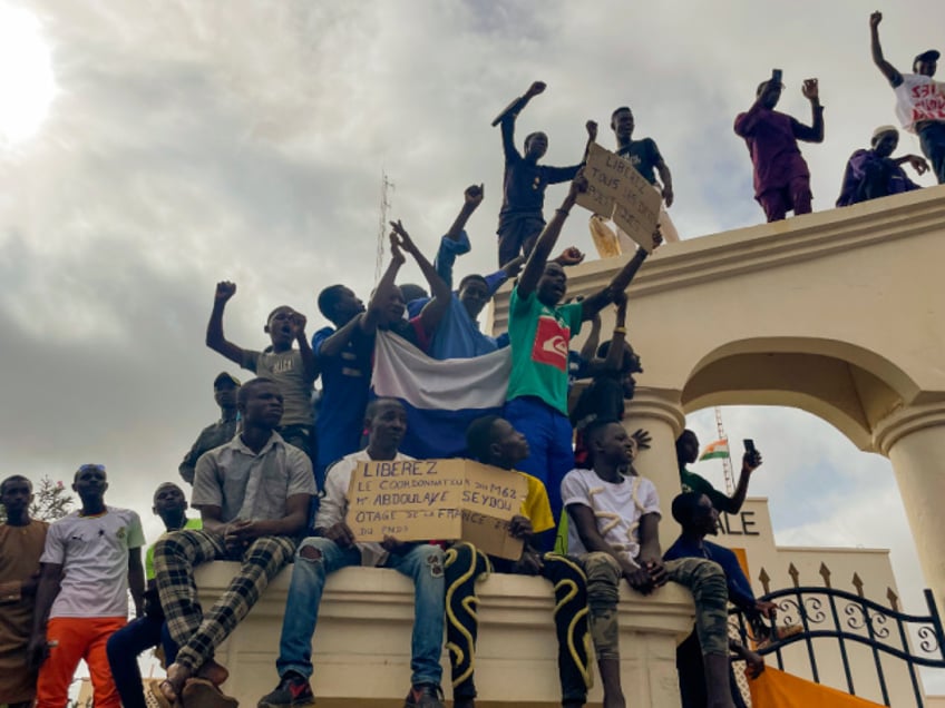 FILE - Supporters of Niger's ruling junta gather at the start of a protest called to fight for the country's freedom and push back against foreign interference in Niamey, Niger, Aug. 3, 2023. As several European countries evacuate Niger, the Biden administration is showing itself unusually intent on staying. It sees Niger as the United States' last, best counterterrorism outpost — and until the coup, a promising democracy — in a region plagued by instability. (AP Photo/Sam Mednick, File)