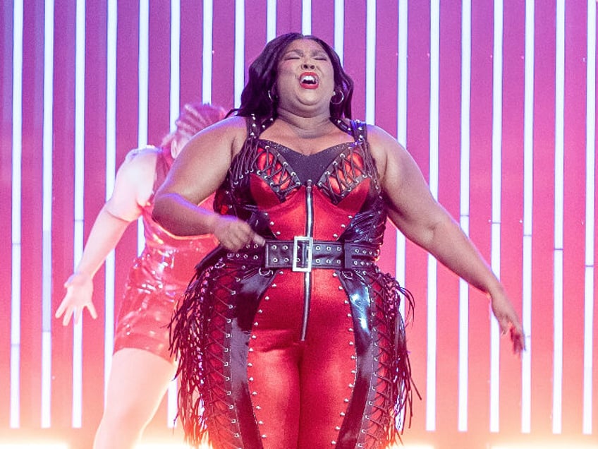 report lizzo sees record sales streaming numbers collapse in wake of sexual harassment fat shaming scandal