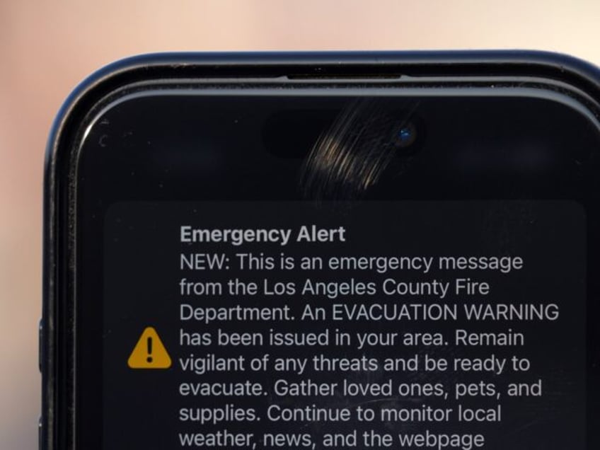 PASADENA, CALIFORNIA - JANUARY 09: An Emergency Alert evacuation warning on the Apple ipho