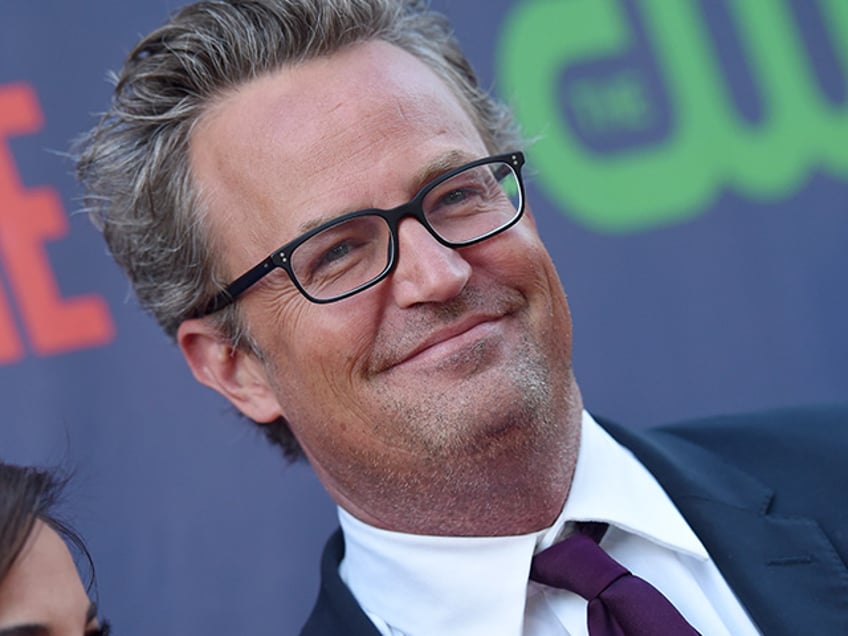 report matthew perry found underwater in his hot tub by assistant