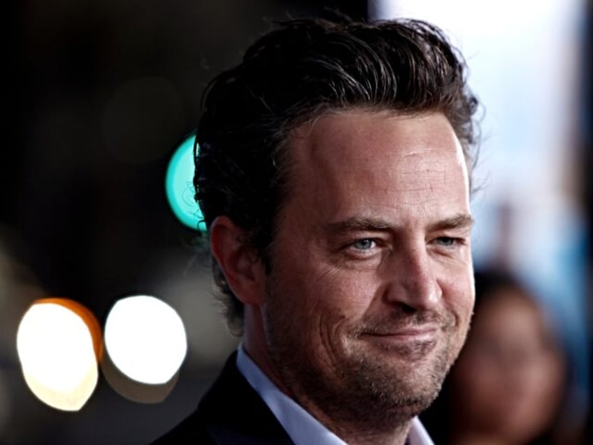 report matthew perry found underwater in his hot tub by assistant