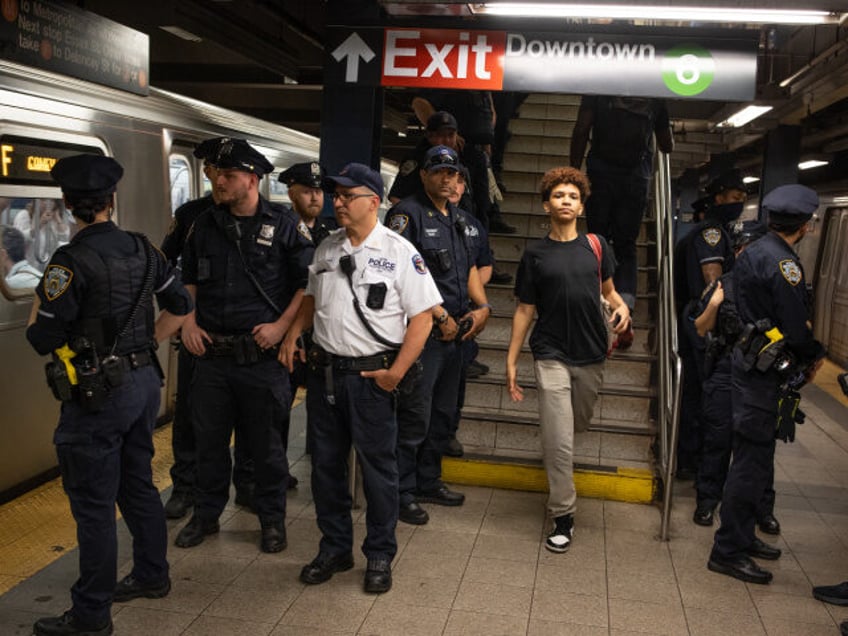 NEW YORK, NEW YORK - MAY 8:Police keep a watchful eye over the Broadway Lafayette subway station, May 8, 2023 in New York City, New York. Neely, a homeless man with mental health issues, was choked to death by a passenger on the F train. (Photo by Andrew Lichtenstein/Corbis via …