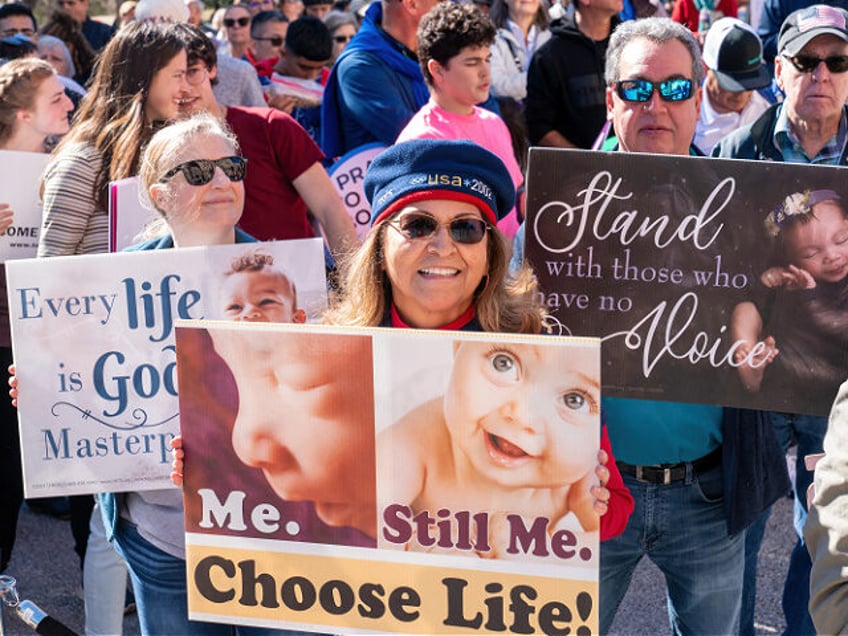 TOPSHOT - Pro-life supporters take part in a "Rally for Life" march and celebration outsid