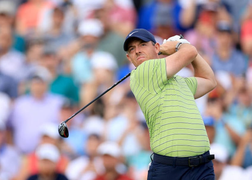 Rory McIlroy of Northern Ireland plays his opening tee shot on the 10th hole during the first round of the 2022 PGA Championship at Southern Hills...