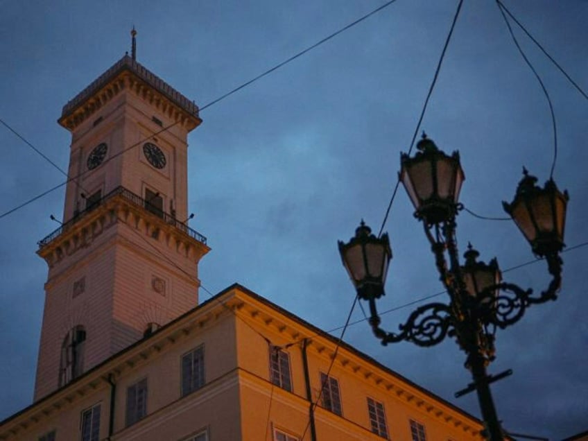 The Lviv Town Hall is pictured during a power outage at night, Lviv, western Ukraine. (Ana