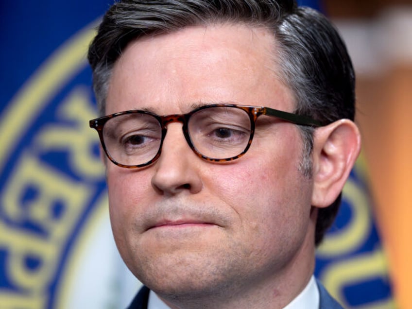 Speaker of the House Mike Johnson, R-La., pauses during a news conference amid threats tha