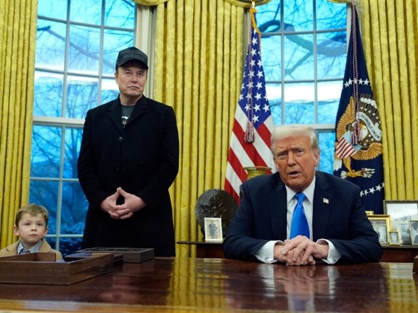 President Donald Trump speaks as he is joined by Elon Musk, and his son X Æ A-Xii, in the
