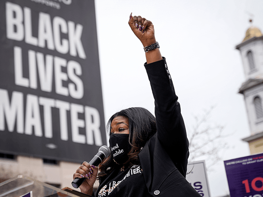 Rep. Cori Bush (D-MO) speaks at the National Council for Incarcerated Women and Girls "100 Women for 100 Women" rally at Black Lives Matter Plaza on March 12, 2021 in Washington, DC. The organization and its supporters are calling on President Joe Biden to release 100 women currently incarcerated in federal prison. (Photo by Drew Angerer/Getty Images)