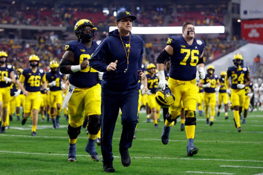 report suspended michigan staffer bought tickets at 11 big ten schools