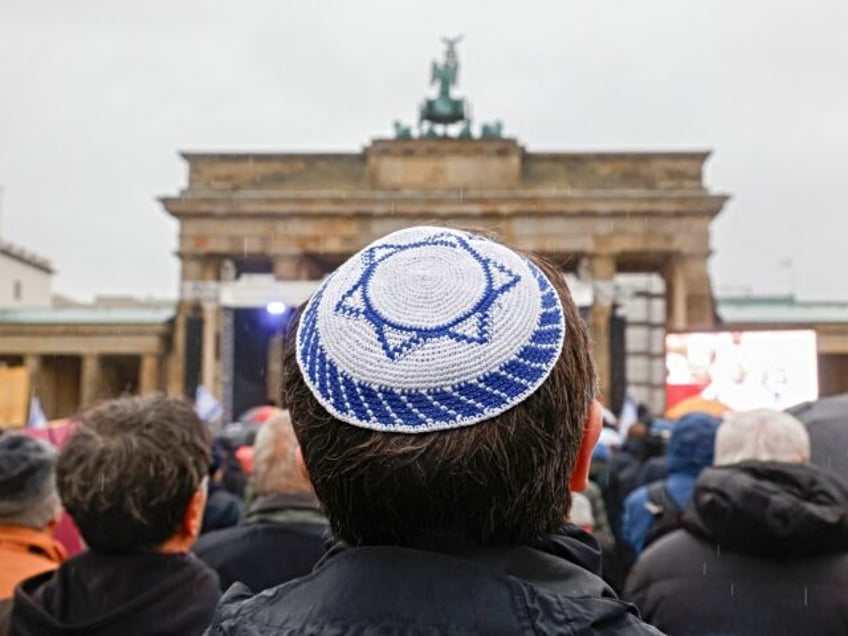 A young man wears a kippah during a demonstration against anti-Semitism on December 10, 20