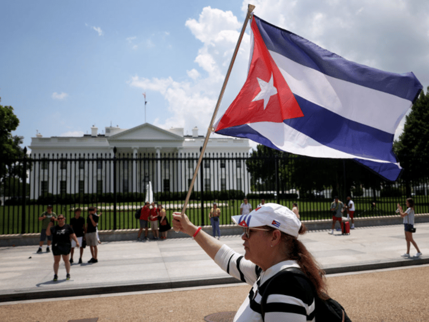 WASHINGTON, DC - JULY 13: Cuban Americans demonstrate outside the White House in support o