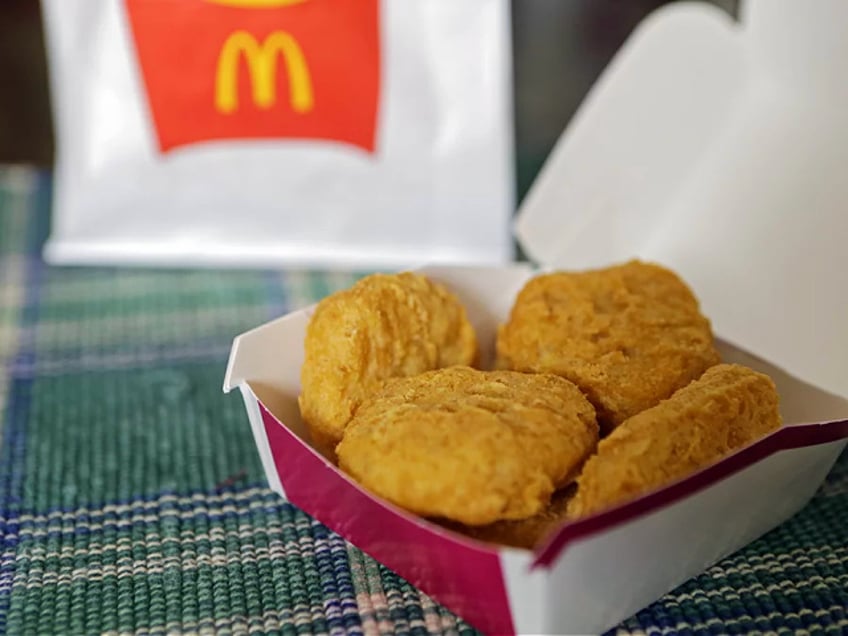 FILE - In this March 4, 2015 file photo, an order of McDonald's Chicken McNuggets is displayed for a photo in Olmsted Falls, Ohio. McDonald’s is testing Chicken McNuggets with no artificial preservatives as it works to revive its U.S. business. The world’s biggest hamburger chain says it began testing the new recipe in about 140 stores in Oregon and Washington in March 2016. (AP Photo/Mark Duncan)