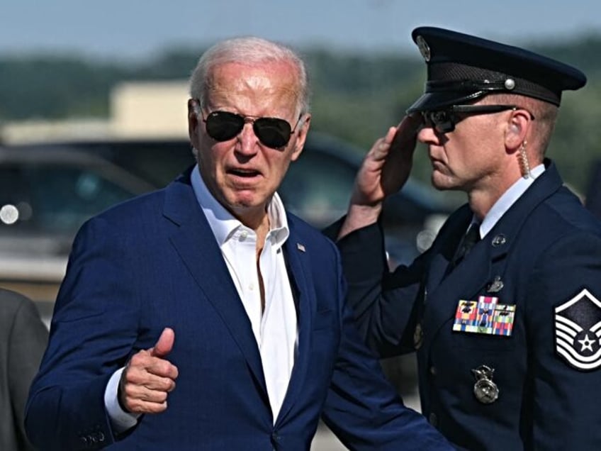 US President Joe Biden gives a thumbs up as he boards Air Force One at Harrisburg Internat