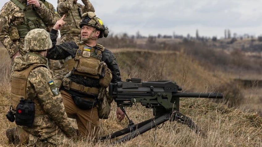 John Roberts conducting training in Ukraine.