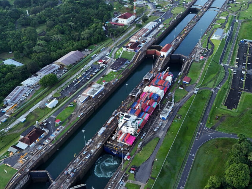 A cargo ship traverses the Agua Clara Locks of the Panama Canal in Colon, Panama, Sept. 2,