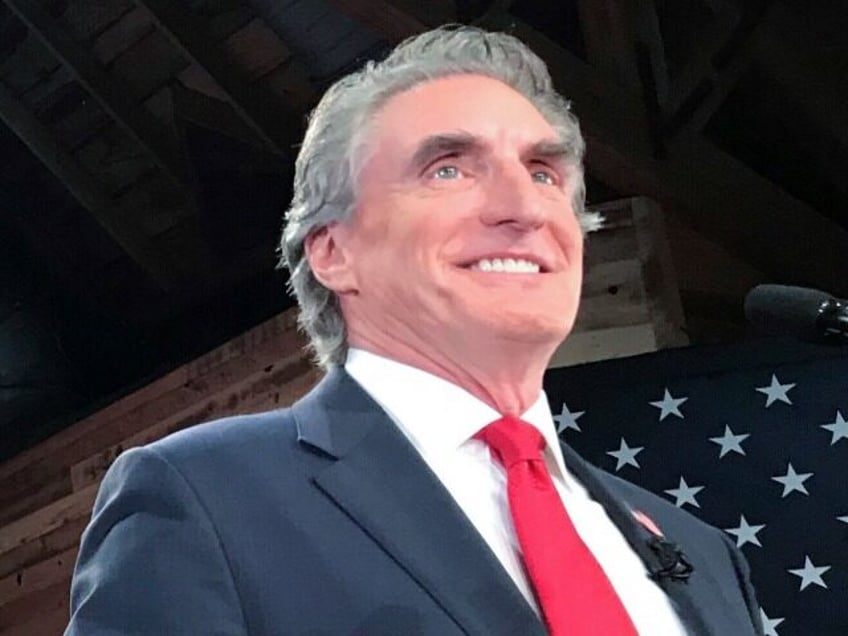 reports north dakota gov doug burgum qualifies for first republican debate