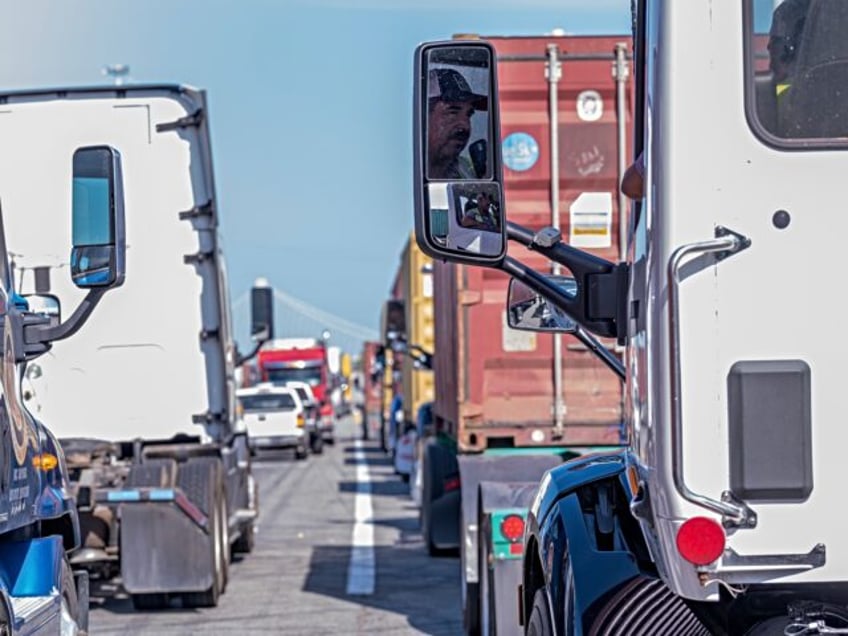 Trucks at the entrance at the Port of Oakland during a protest in Oakland, California, US,