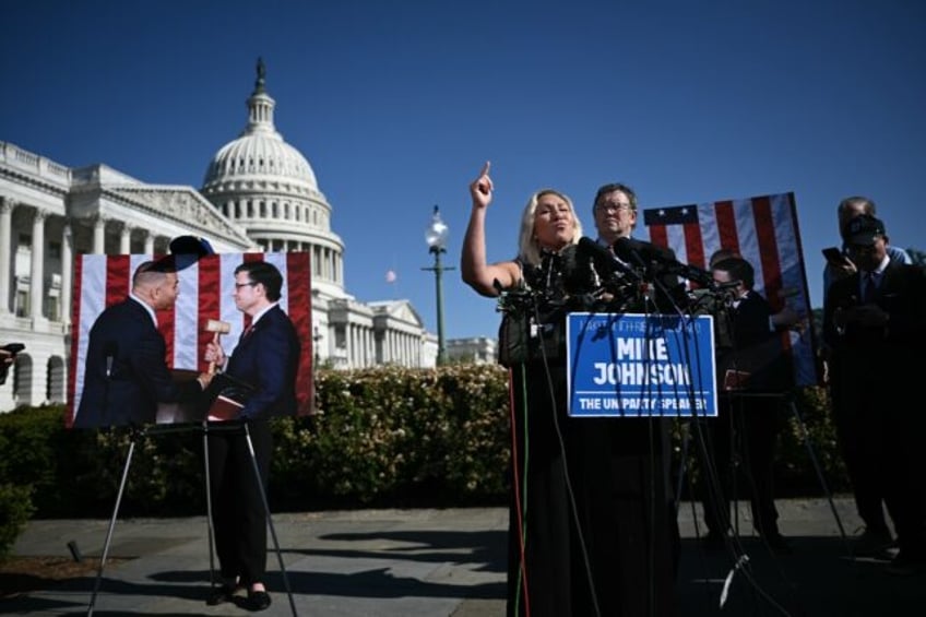 US Republican Representatives Marjorie Taylor Greene (C), holds a press conference on Hous