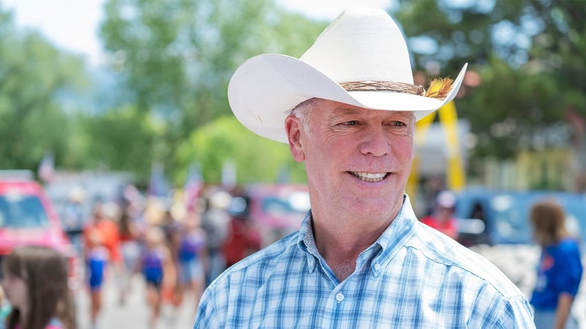 Montana Gov. Greg Gianforte attends the 100th anniversary of the Livingston Roundup Rodeo Parade as grand marshal, July 2, in Livingston, Mont.