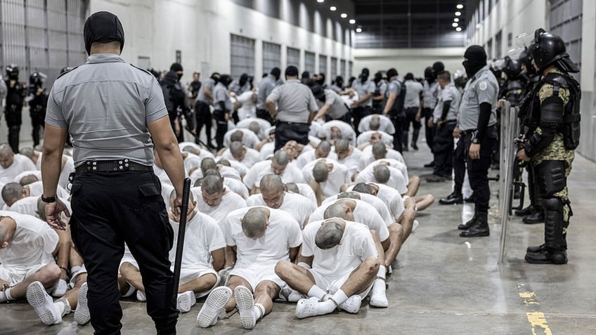 inmates on floor at Salvadoran prison