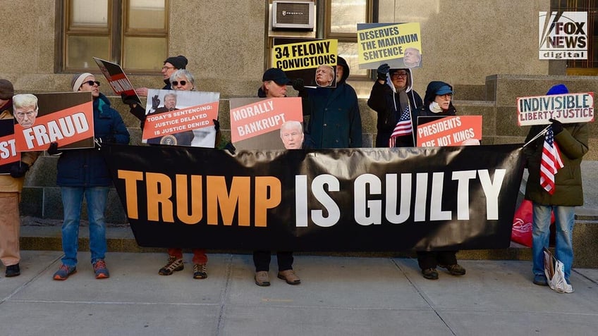 Protesters against Donald Trump outside court for his sentencing