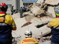 Rescue efforts for workers trapped in South Africa building collapse continues, 1 more survivor found