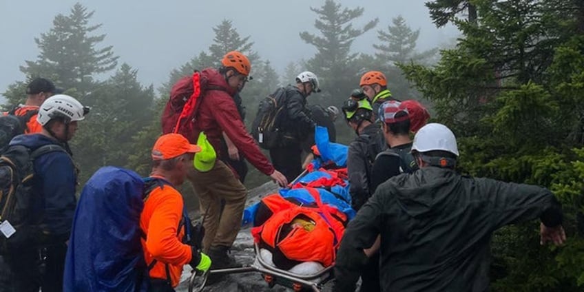 rescuers carry injured nh hiker 70 down mountain after severe weather blocks arrival of blackhawk helicopter