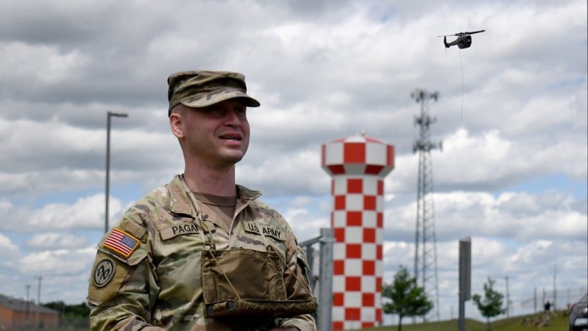 U.S. Army Spc. Johnny Pagan, an infantryman with the New York National Guard's 1st Battalion, 69th Infantry Regiment, and a native of Manhattan, controls a soldier-borne sensor unmanned aerial vehicle.