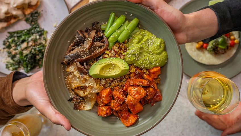 True Food Kitchen's Ancient Grains Bowl is held for display.