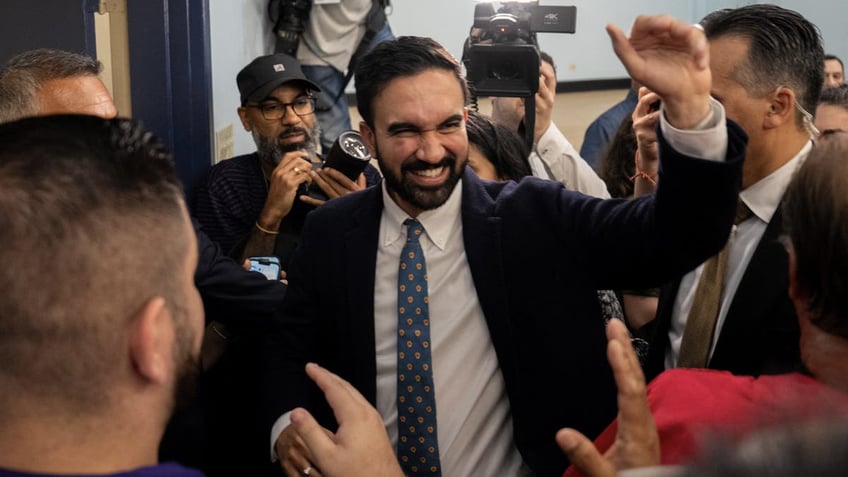 New York City Democratic Party mayoral nominee Zohran Mamdani is surrounded by supporters after a press conference with union leaders in New York City, on July 2, 2025. REUTERS/David 'Dee' Delgado