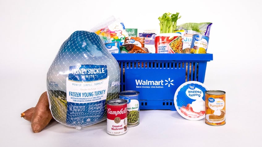 Walmart basket full of items for Thanksgiving dinner.